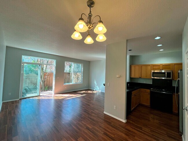 Building Photo - Elegant Arbor Townhome with Open Kitchen, W/D, Patio, and Soaking Tub
