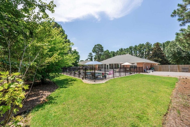 Building Photo - "Coastal Elegance Awaits: Spacious 4-Bed Oasis with Granite Touches on Shipwreck Road"