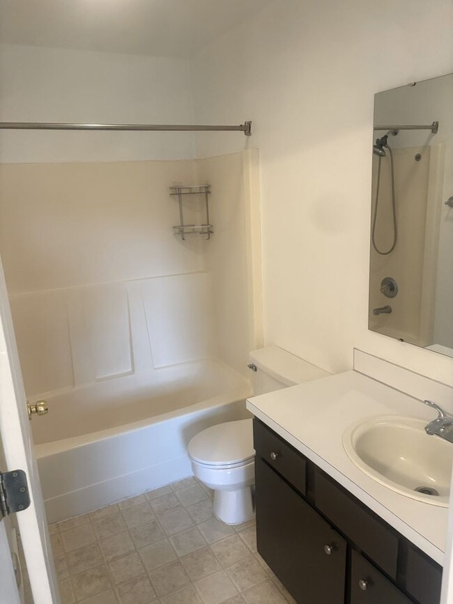 Building Photo - Three Bedroom Duplex