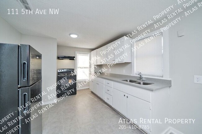 Building Photo - 111 5th Ave NW