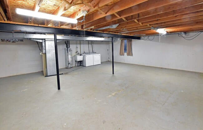 Building Photo - Shelby Township-2 Bedroom Duplex with Basement, Deck & Attached Garage