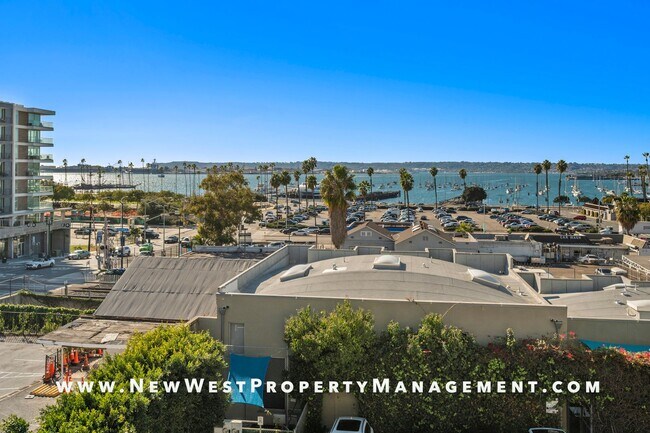 Building Photo - Views, Views, Views! Stunning Top-Floor Little Italy 2-bedroom Loft at The Waterfront!