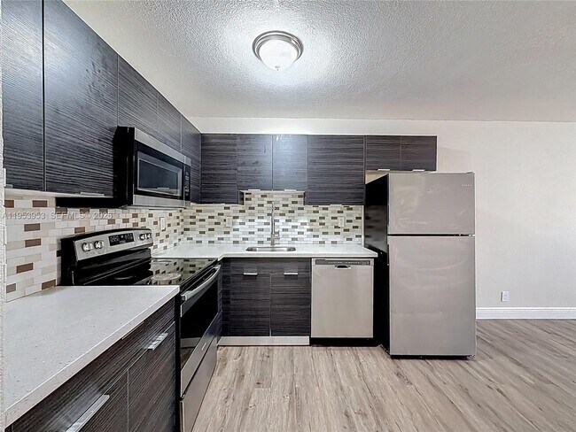 Building Photo - 1800 NW 52nd Ave