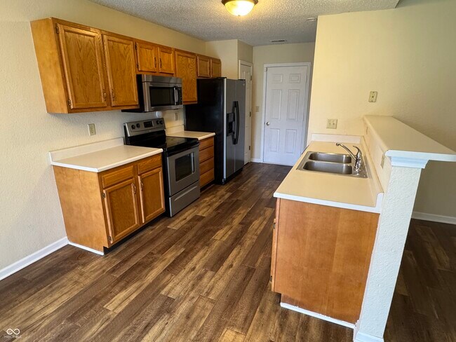 Building Photo - 7644 Scatter Woods Ln