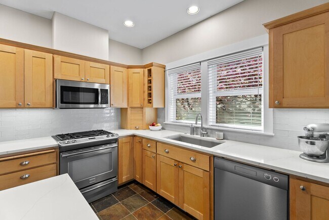 Building Photo - **Spacious 4-Bedroom Craftsman Home on Awb...