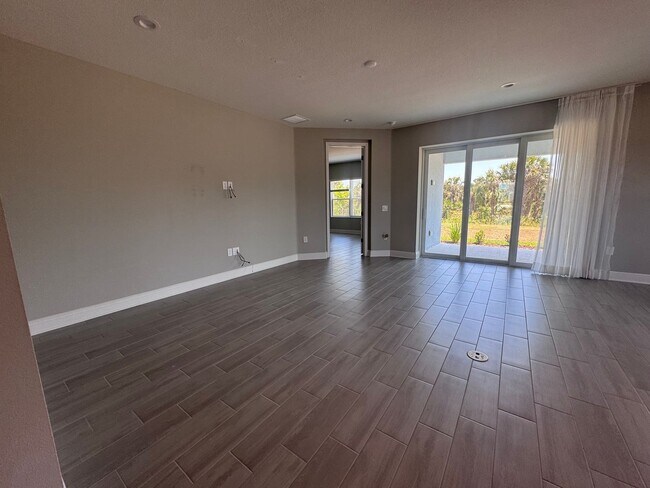 Building Photo - New Construction in Grand Park-4 Bedrooms and 4 Bathrooms with a Den and a Loft! No deposit for q...