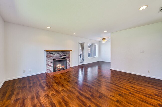 Building Photo - 3BR + Office Home in Excellent Condition with Storage Sheds and Garage Workspace!