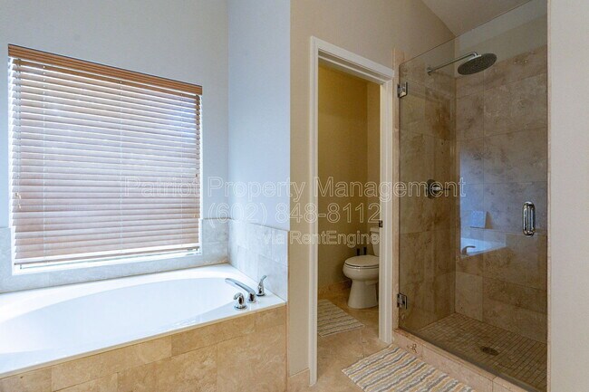 Building Photo - 9910 E Sutton Dr
