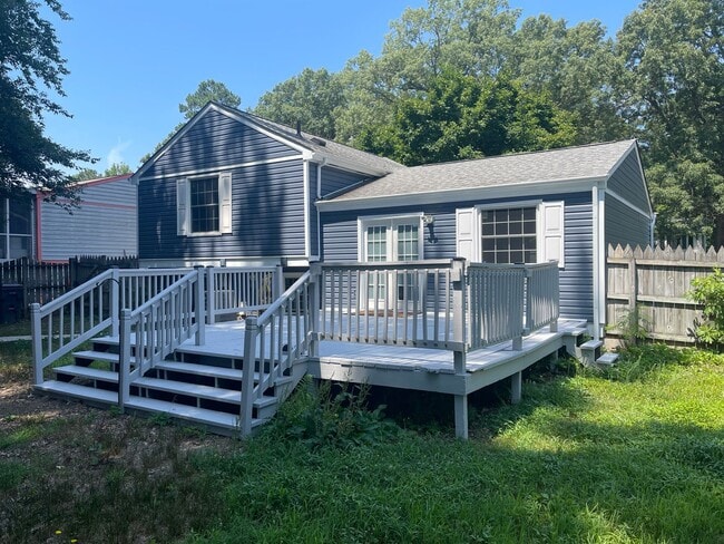 Building Photo - Updated Tri-Level home with solar panels!