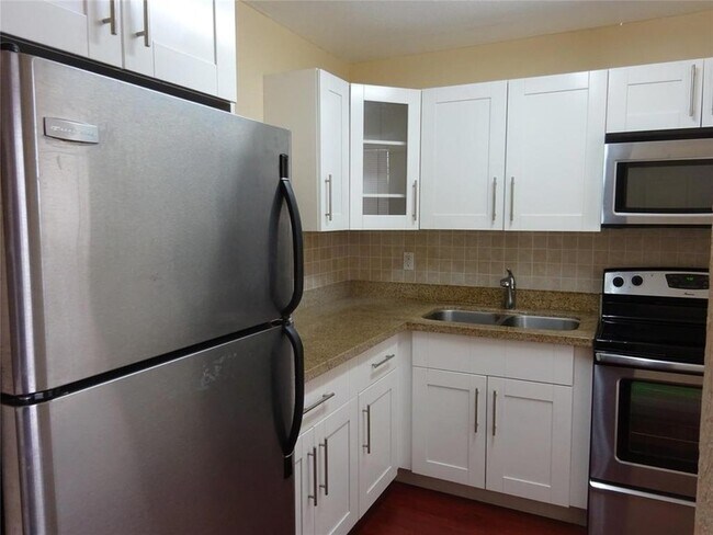 Building Photo - 6050 NW 64th Ave