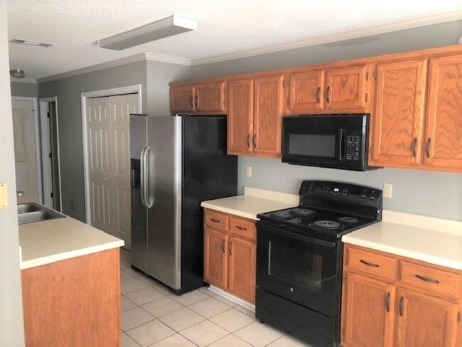 Building Photo - 3931 Muirfield Dr