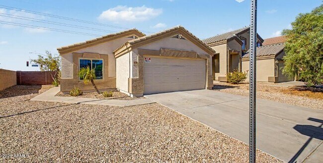 Building Photo - 23765 W Desert Bloom St