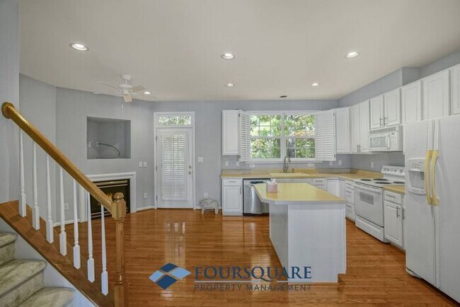 Building Photo - Lakefront Townhome with 1st Floor Bedroom, Fireplace & 2-Car Garage – In Raleigh