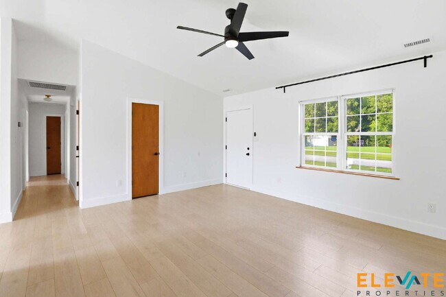Building Photo - Beautiful Like-New 3 Bedroom Home with Huge Fenced Yard, Greenhouse & Storage