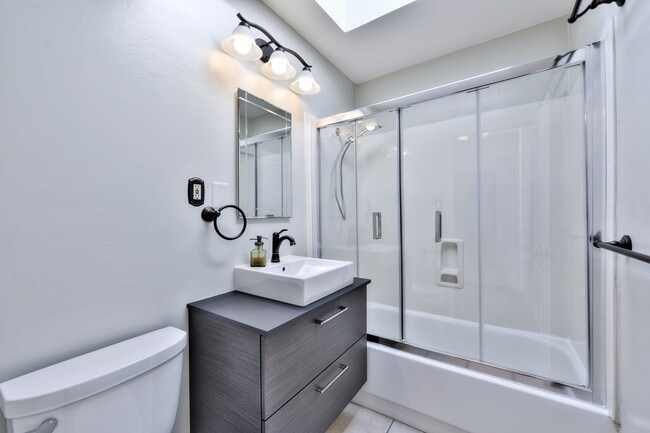 Building Photo - Light filled home+ Pet Friendly + Deck+ Lo...