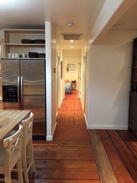 Hallway view from kitchen/dining area. - 285 Washburn Ave