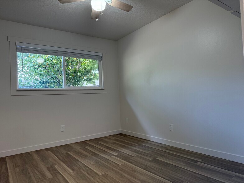 Bedroom 2 includes wall mounted cabinets for extra storage - 2107 Y St