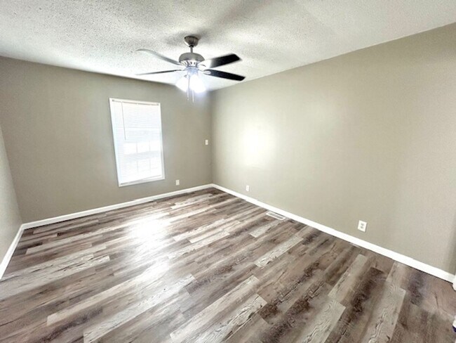 Building Photo - Spacious 4-Bedroom, 2-Bath Home Located in...