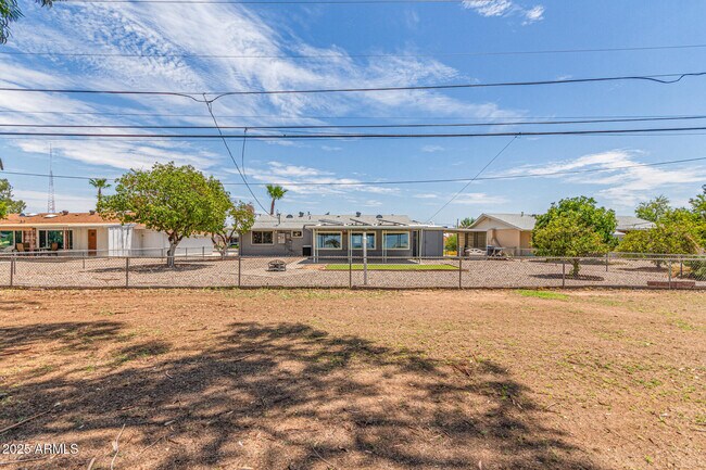 Building Photo - 12640 N Pebble Beach Dr