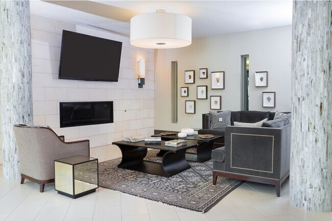 Building Photo - Spacious Than You Think & Richly Featured