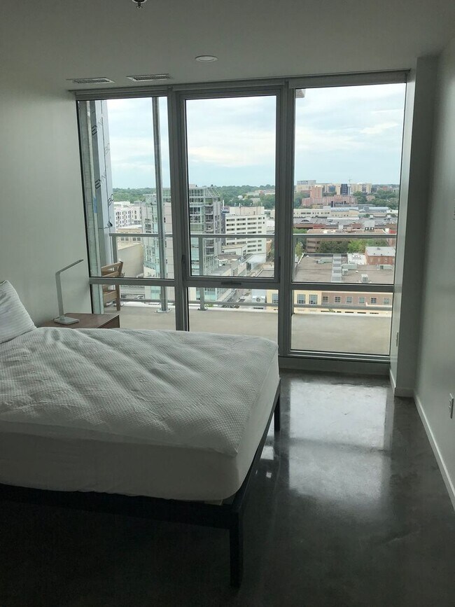 Building Photo - AVAILABLE SPRING 2027 - Downtown Iowa City High-Rise Condo with Amazing Views