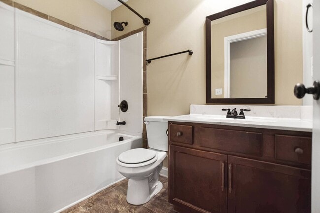 Building Photo - Pet Friendly Three Bedroom with Bonus!