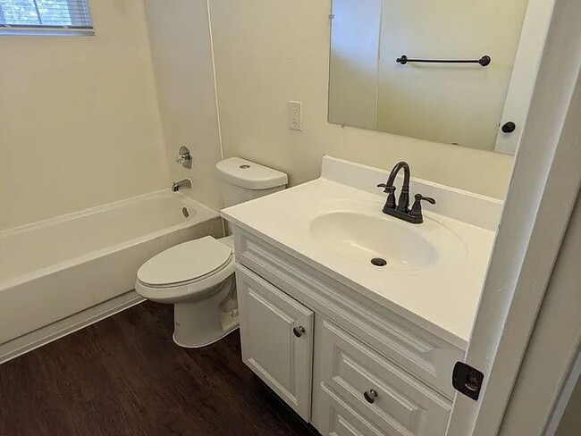 Building Photo - Available Now! Pet-Friendly 2 Bed/ 1.5 Bath with Patio & Parking