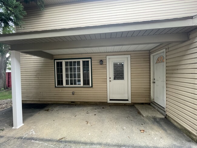 Shared covered porch area. - 207 Market St