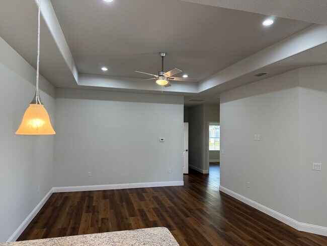 Building Photo - Brand new 3/2/1 with screed in porch and fenced yard! 2 units available