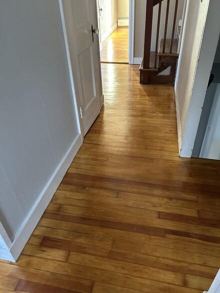 Hallway, all hardwood floors sanded and refinished - 36 Niles Rd