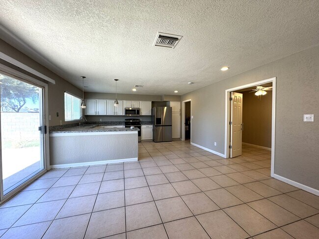 Building Photo - CORNER LOT 3 BEDROOM PLUS DEN WITH FIREPLACE AND LARGE YARD