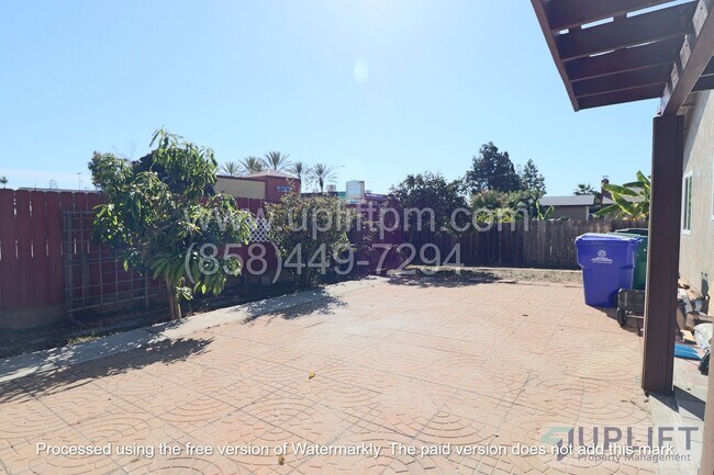 Building Photo - 4 bed, 2 Bath Home With Fenced Yard and attached 2 Car Garage