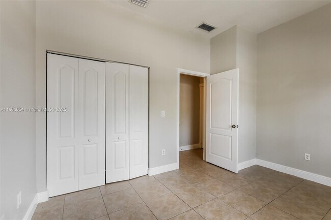 Building Photo - 1695 NE 37th Pl