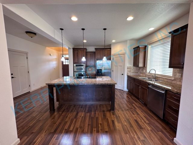 Building Photo - Spacious 5-Bedroom Retreat with 3407 Sq Ft...