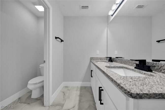 Building Photo - 3095 NW 4th Pl