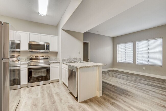 Building Photo - Upgrated upstairs 2 Bedrm 2 bath Gated Com...