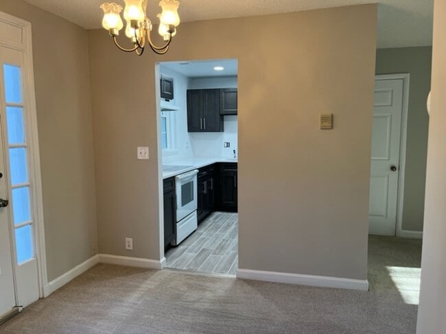 Building Photo - This residence showcases a beautifully upd...