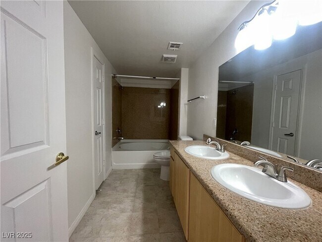 Building Photo - 8000 W Badura Ave