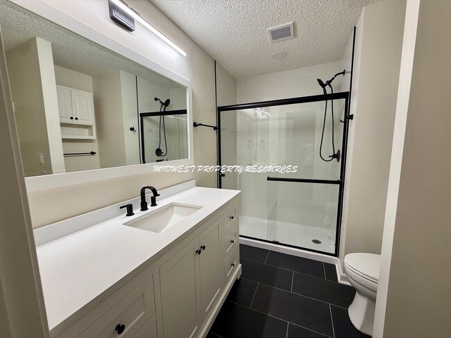 Building Photo - Spacious 3 Bedroom Home with Finished Basement, Covered Deck & Fenced Yard