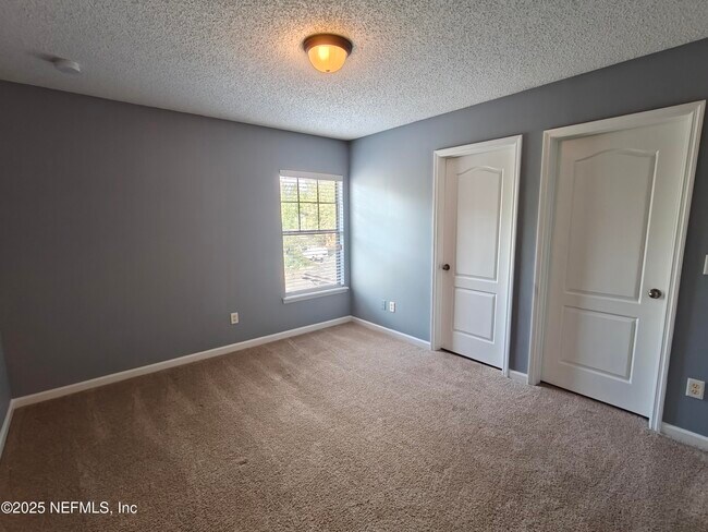 Building Photo - 7764 Playschool Ln
