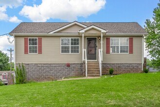 Building Photo - Pet Friendly Three Bedroom with Basement!