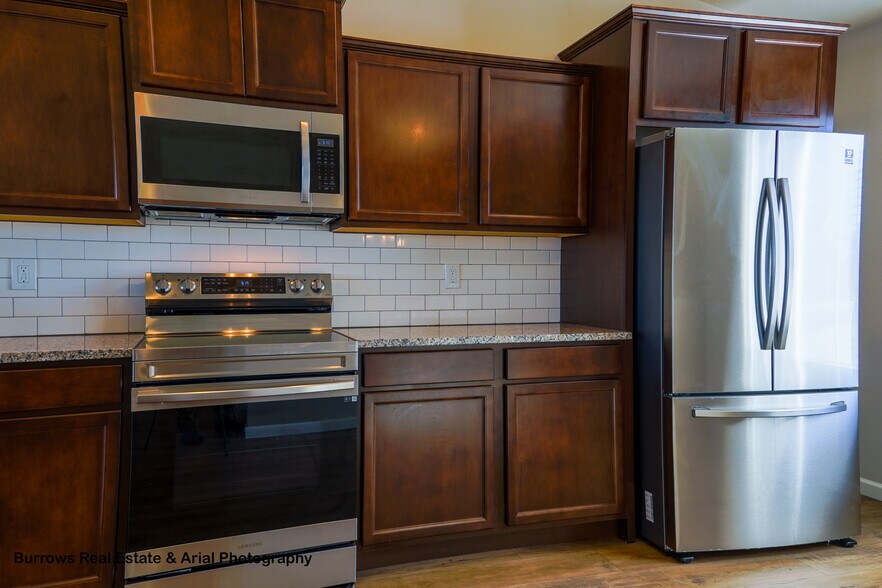 Main Floor Kitchen - 8297 W Sturtevant Ave
