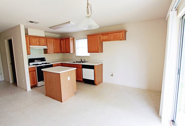 Building Photo - South Austin Home w/ Kitchen Island, Vaulted Ceilings & Mature Trees