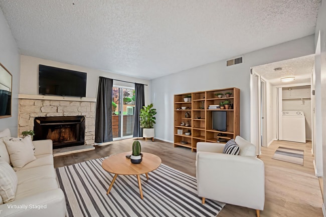 Building Photo - Updated 1 Bed Condo | Reserved Parking, Covered Patio & Fireplace