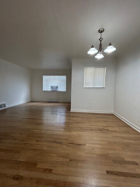 Building Photo - Available now! Spacious living room. Newly...