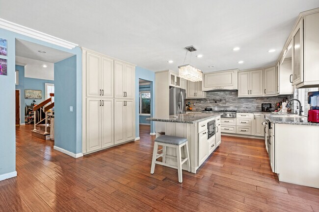 Building Photo - Spacious 4BR Family Retreat w Private Pool