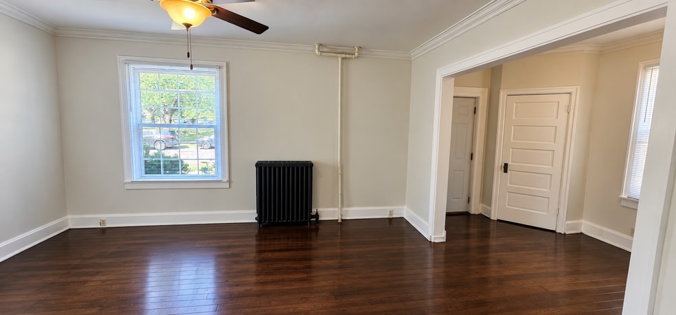 Living room with floor to be refinished - 263 N Prairie St