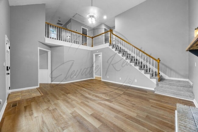 Building Photo - Four Bedroom Two Story with Two Car Garage...
