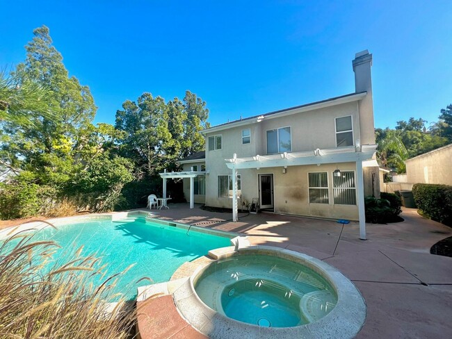 Building Photo - **3 Bedroom + Den & 3 bathroom Pool Home w...