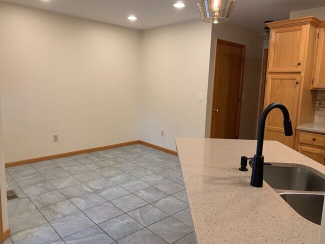 Building Photo - West-Side Gem! Sprawling Single-Family Home w/ Finished Basement